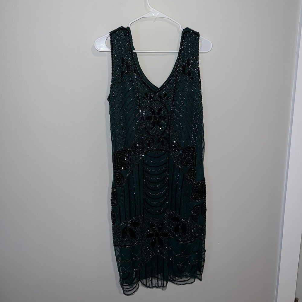 Green beaded dress.